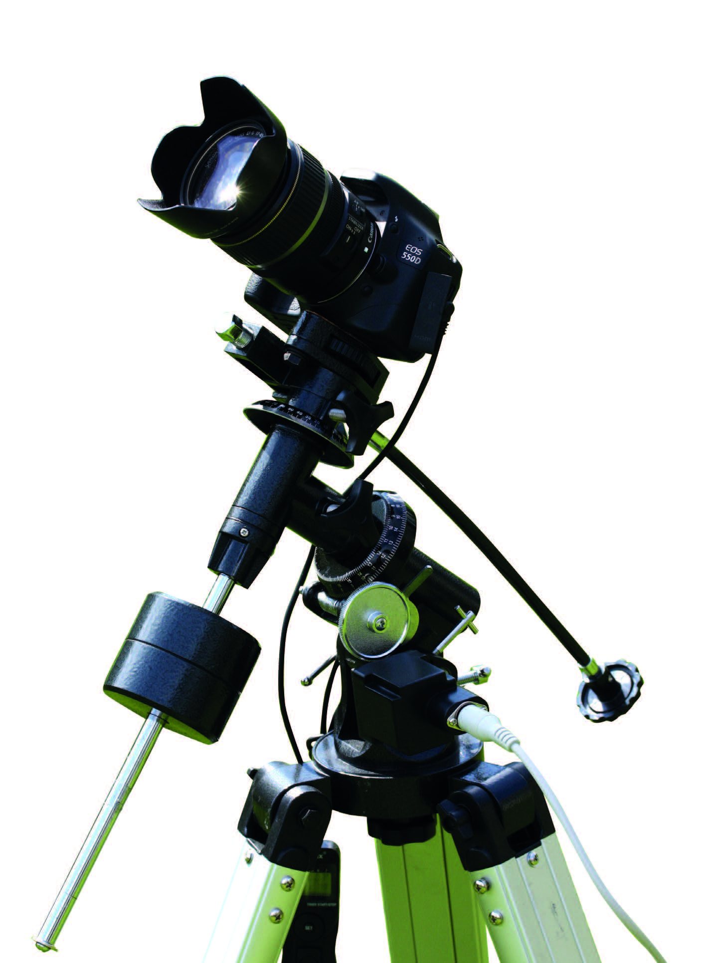 An affordable EQ-2 equatorial mount carrying a DSLR with a lightweight telephoto lens. The counterweight on the axis, which compensates for the weight of the camera, is clearly visible. While the camera can be aligned in one axis with the flexible shaft (to the right in the picture), the second axis is driven by a motor to compensate for the rotation of the night sky. This combination works well for capturing star fields.