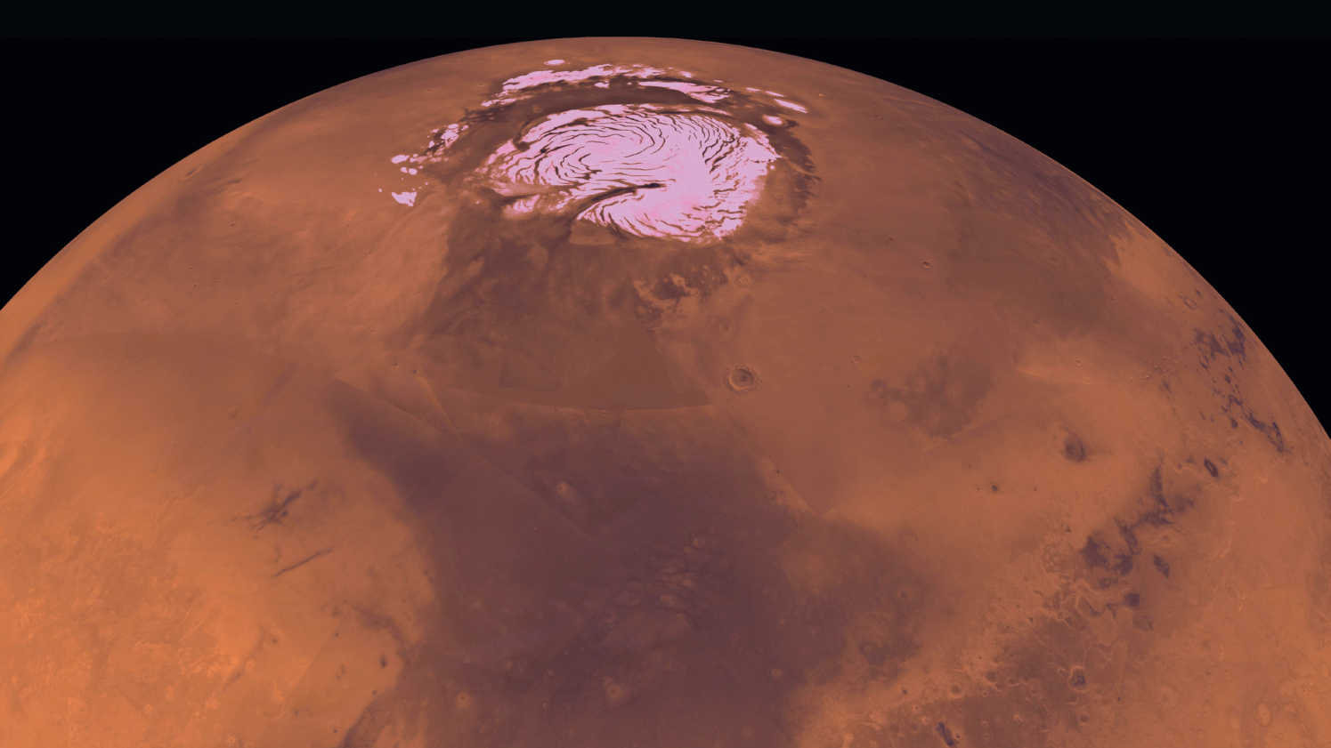 Fotografie
des Mars aus dem
Orbit mit Blick auf die
Polkappe. NASA/JPL/USGS